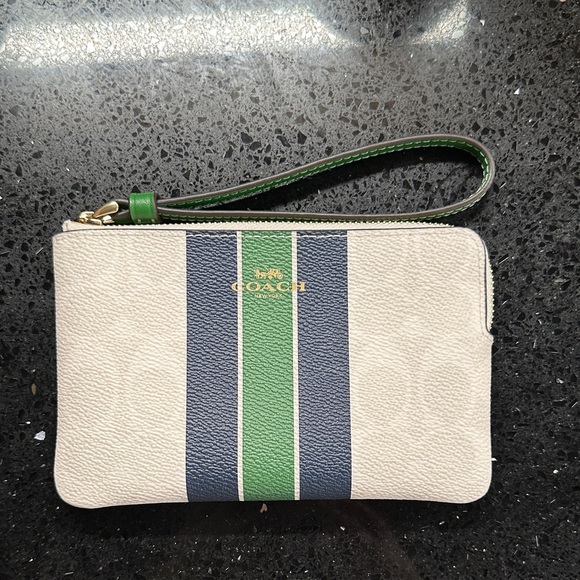 Coach Handbags - Coach Cream Wristlet with Green and Blue Stripes